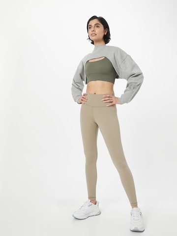 Athlecia Skinny Športne hlače 'Gaby' | siva barva
