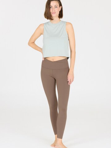 Athlecia Skinny Sports trousers 'Snyder' in Brown