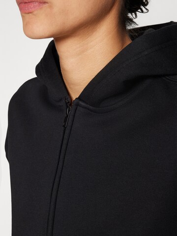 Fabletics Urheilullinen collegetakki värissä musta