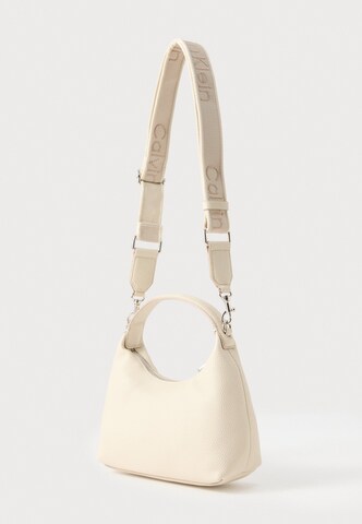 Calvin Klein Shoulder Bag in Beige: side