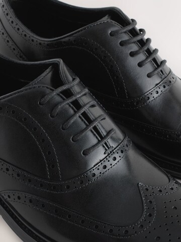 Chaussure à lacets Next en noir