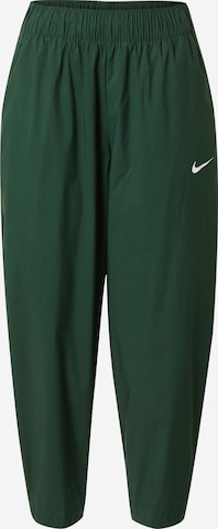 Pantaloni de la Nike Sportswear pe verde: față