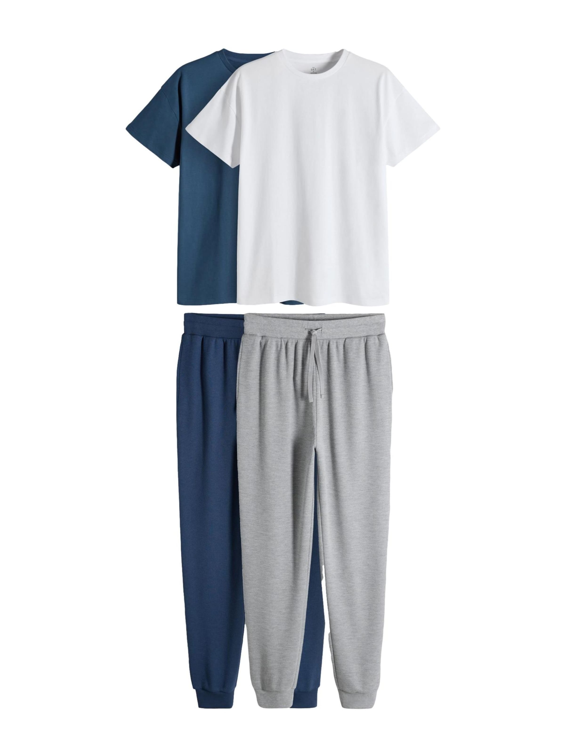 The SetJednodijelna pidžama - plava boja: prednji dio