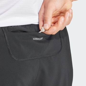 regular Pantaloni sportivi 'Own The Run' di ADIDAS PERFORMANCE in nero