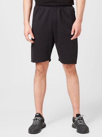 Hummel Regular Sports trousers in Black: front