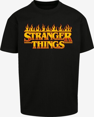 F4NT4STIC Shirt 'Stranger Things Fire Logo Netflix TV Series' in Zwart: voorkant