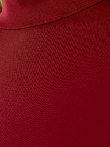 Hiccup Blusenbody‌ in Rot