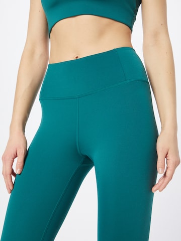 Skinny Pantaloni sport de la Girlfriend Collective pe verde