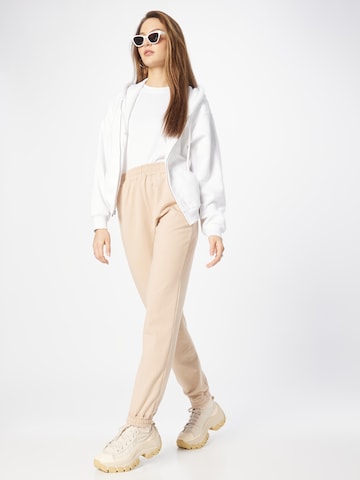 ABOUT YOU Tapered Pants 'Naomi' in Beige