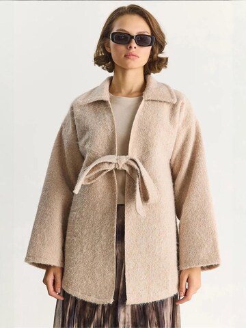 Bianco Lucci Knit Cardigan in Beige: front
