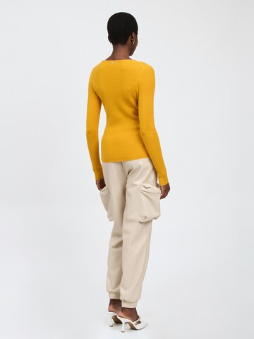 Influencer Pullover in Gelb
