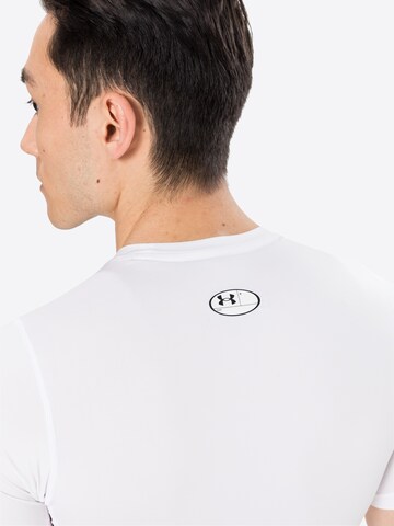 Maglia funzionale di UNDER ARMOUR in bianco