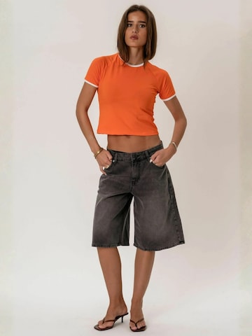 It's May Top ' Rosa ' in Orange