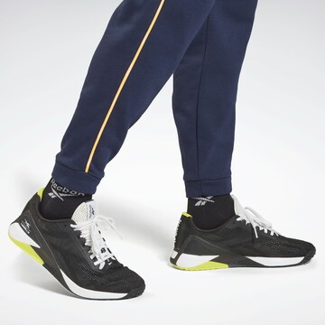 Tapered Pantaloni sport de la Reebok pe albastru