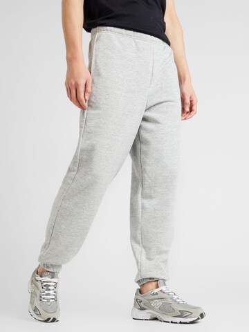 Effilé Pantalon Champion Authentic Athletic Apparel en gris : devant