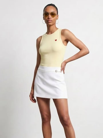 Top di Dilvin in giallo
