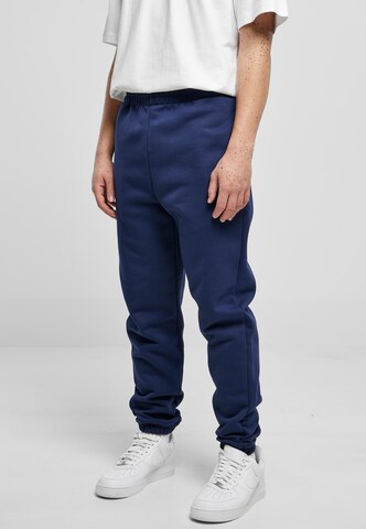 Tapered Pantaloni di Urban Classics in blu