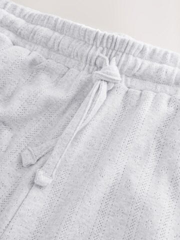 Pijama de la Next pe gri