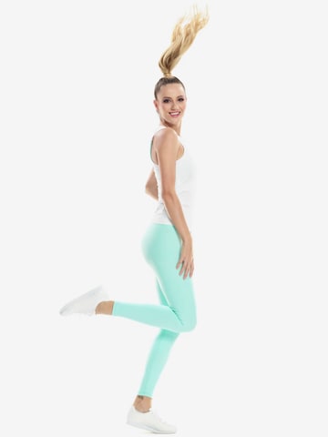 Skinny Pantaloni sportivi 'HWL117C' di Winshape in verde