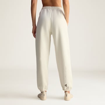 ADIDAS BY STELLA MCCARTNEY Tapered Sports trousers in White