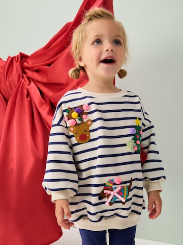 Next Set i beige: framsida