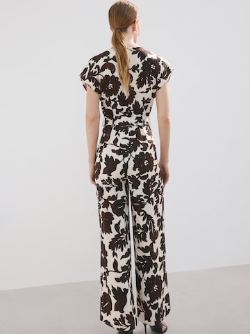 Salopeta 'Simba' de la MANGO pe bej