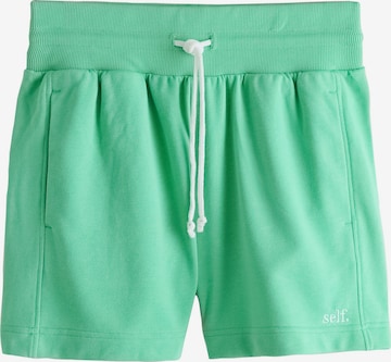 self. Pants in Green: front
