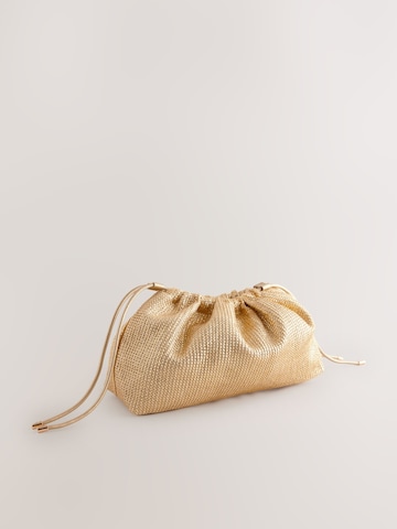 Pochette di Next in oro