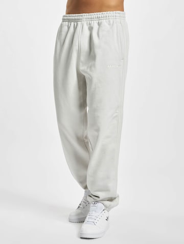 ADIDAS ORIGINALS Tapered Pants 'Reveal Essentials' in White: front