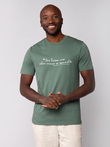Watapparel Shirt 'Das Haben Wir Schon Immer So Gemacht' in Green: front