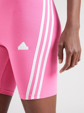 ADIDAS SPORTSWEAR Skinny Športne hlače 'Future Icons' | roza barva