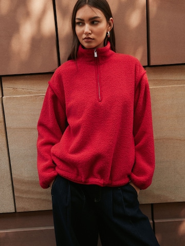 Pull-over Next en rouge : devant