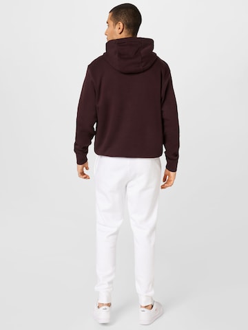 Effilé Pantalon 'Club Fleece' Nike Sportswear en blanc