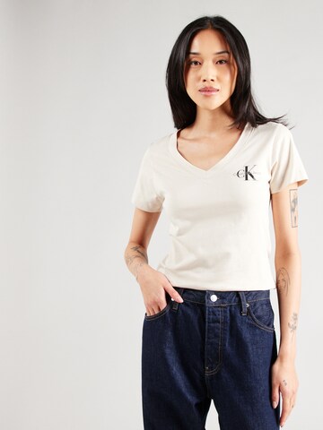 Calvin Klein Jeans Tričko - Sivá: predná strana