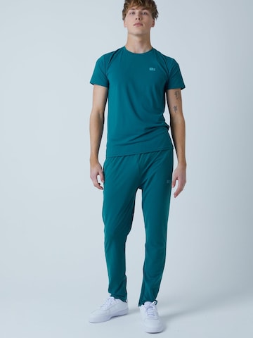SPORTKIND - Slimfit Pantalón deportivo 'Slim Training Pants' en verde: frente