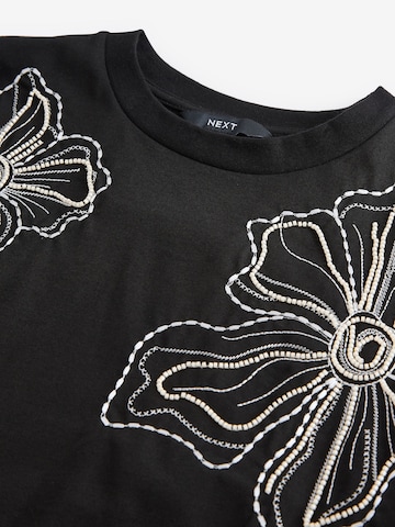 T-shirt Next en noir