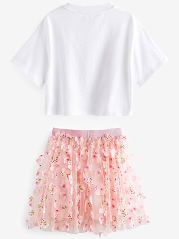 Set Next en rose