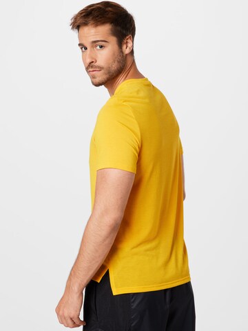 Reebok Regularny krój Koszulka funkcyjna w kolorze żółty