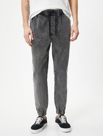 Koton Tapered Jeans in Grijs: voorkant