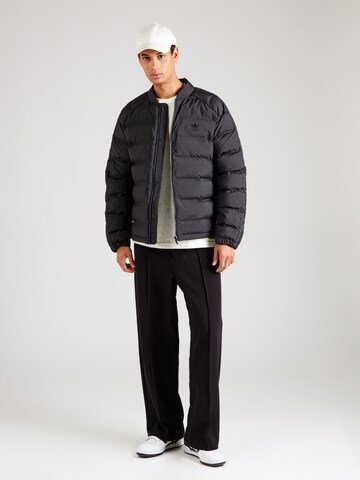 ADIDAS ORIGINALS - Chaqueta de entretiempo en negro
