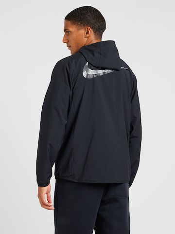NIKE Urheilutakki 'FORM' värissä musta