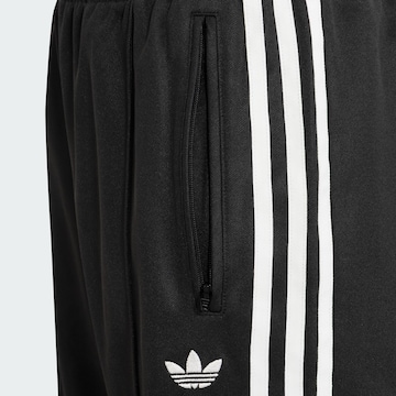 Loosefit Pantalon de sport '2IN1 FIREBIRD LOOSE LACE SKIRT' ADIDAS ORIGINALS en noir