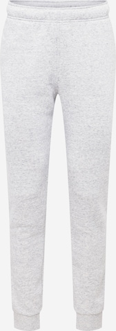 Effilé Pantalon de sport Champion Authentic Athletic Apparel en gris : devant