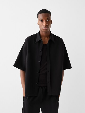 Bershka Voľný strih Nohavice - Čierna