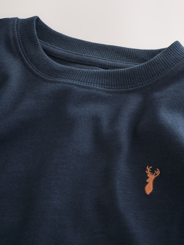 T-Shirt Next en bleu