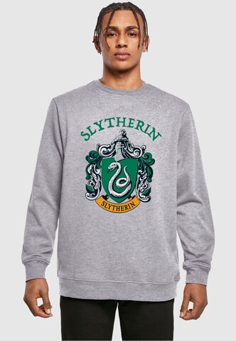 Sweat-shirt 'Harry Potter - Slytherin Crest' ABSOLUTE CULT en gris : devant