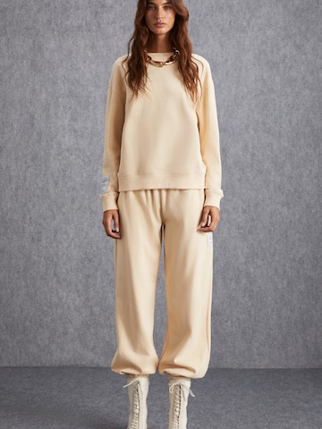 Grimelange - Sudadera en beige