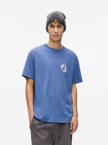 zils KARL LAGERFELD JEANS T-Krekls 'MONOGRAM': no priekšpuses