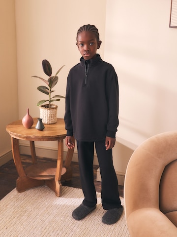 Pyjama Next en noir : devant