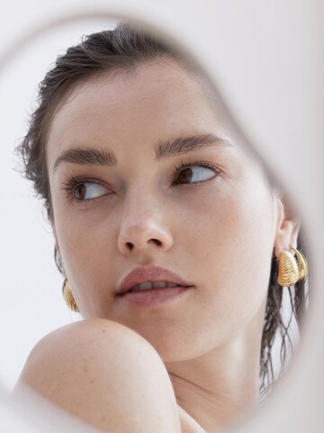 Echtzeit Ohrringe in Gold